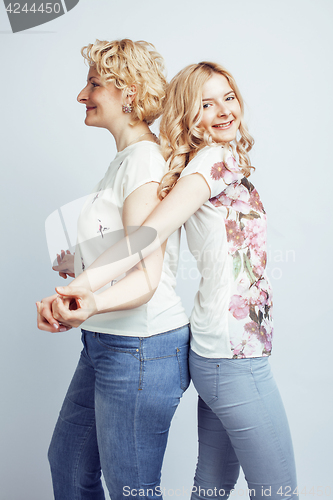 Image of mother with daughter together posing happy smiling isolated on white background with copyspace, lifestyle people concept closeup