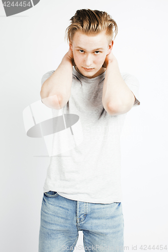 Image of young handsome teenage hipster guy posing emotional, happy smiling against white background isolated, lifestyle people concept closeup