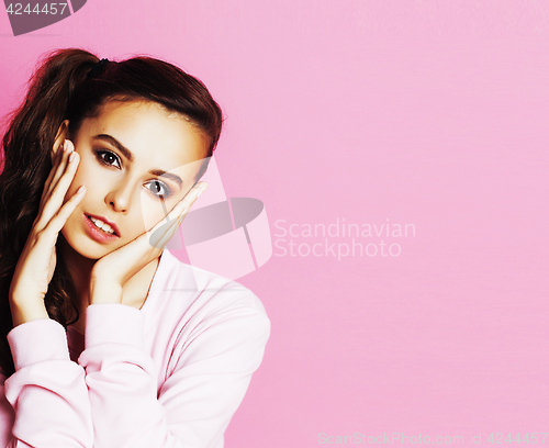 Image of young cute disco girl on pink background smiling adorable emotions copyspace, lifestyle people concept