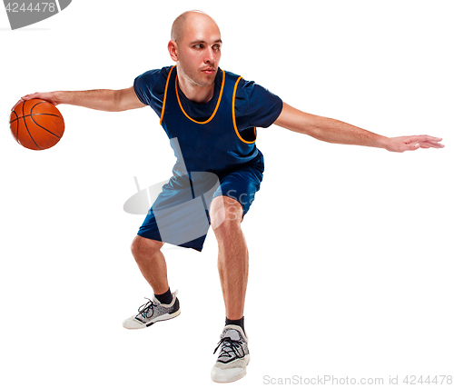 Image of Full length portrait of a basketball player with ball