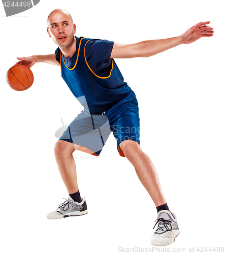 Image of Full length portrait of a basketball player with ball