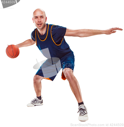 Image of Full length portrait of a basketball player with ball