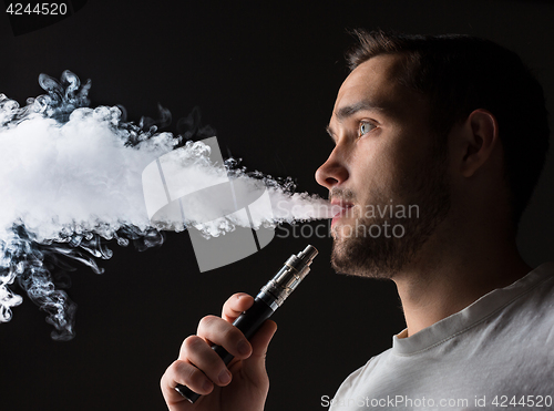 Image of The face of vaping young man