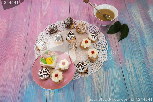 Image of cakes on color background