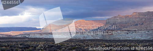 Image of Storm Brewing Sun Hits Red Rock Walls Grand Staircase-Escalante 