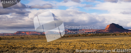 Image of Storm Brewing Sun Hits Red Rock Walls Grand Staircase-Escalante 