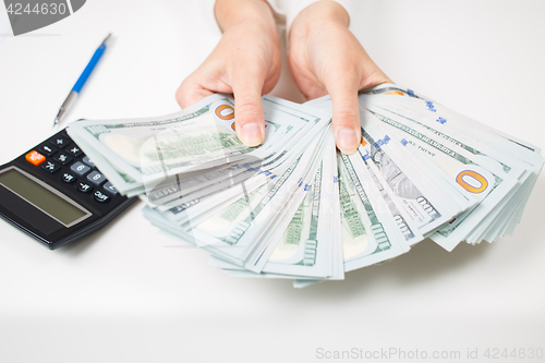 Image of Hands with money