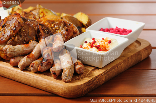 Image of Big grilled meat and vegetables board