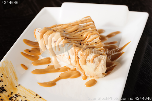 Image of Delicious cheesecake with caramel topping