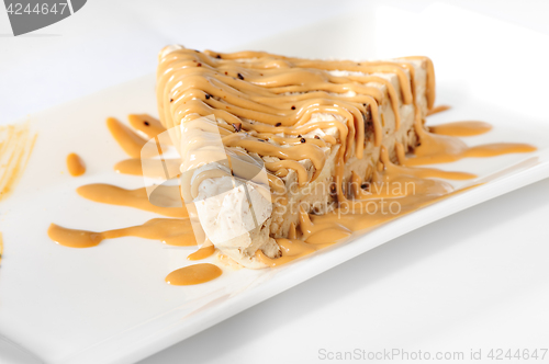 Image of Delicious cheesecake with caramel topping