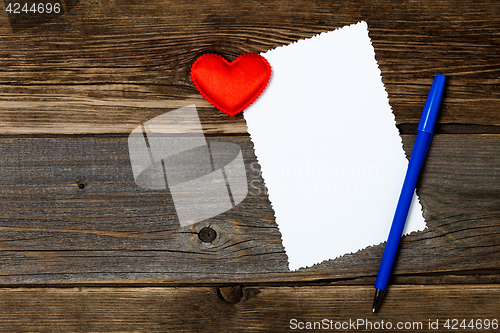 Image of holiday card. empty blank, pen and red heart