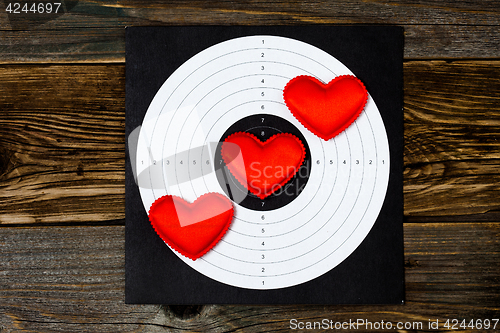 Image of Greeting holiday card with three red hearts