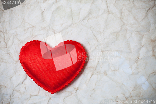 Image of Red hearts on a old paper blank