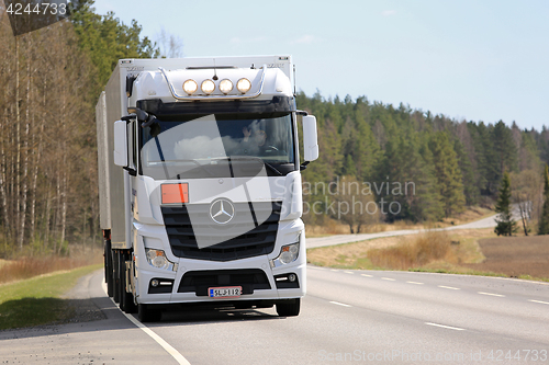 Image of White Mercedes-Benz Actros Refrigerated Transport on the Move