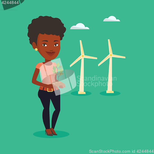 Image of Woman holding small plant vector illustration.