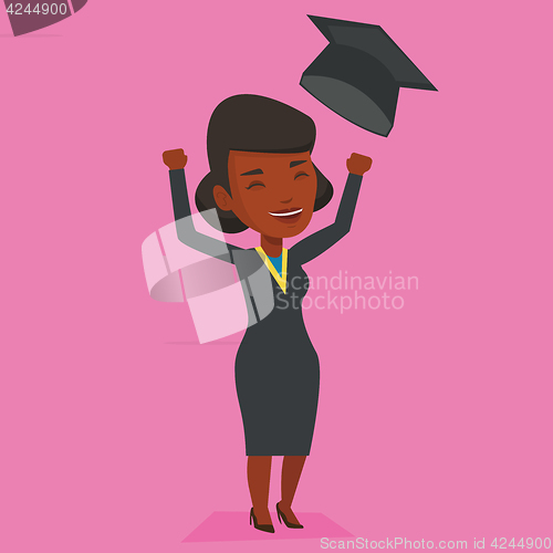 Image of Graduate throwing up graduation hat.