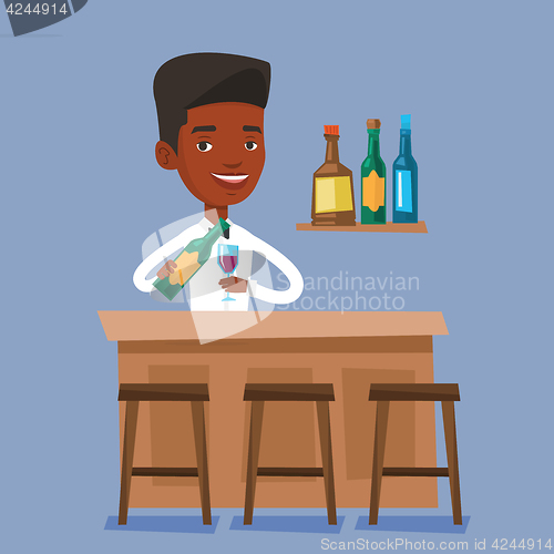 Image of Bartender standing at the bar counter.
