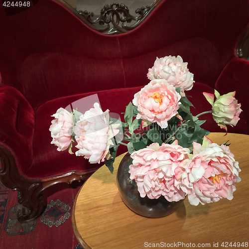 Image of Vintage style interior with bouquet of roses