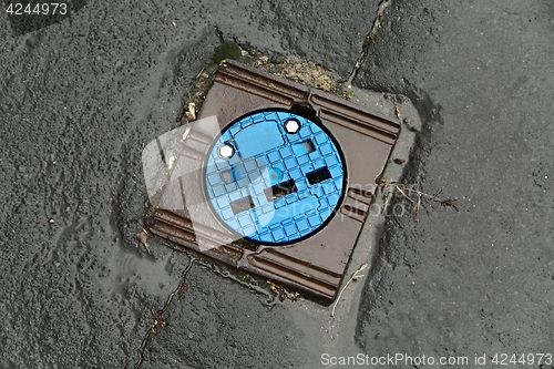 Image of Sewer cover on a street