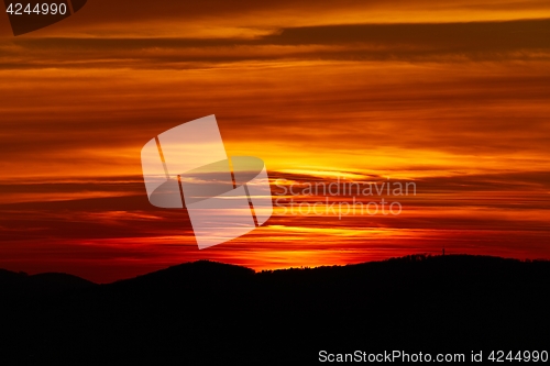 Image of Sunset Hilly Landscape