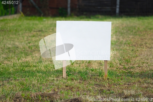Image of Empty sign on a land
