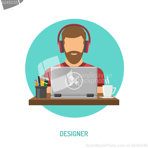 Image of Designer freelancer working on laptop