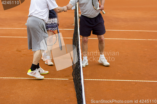 Image of Tennis players shake hands after the tennis match