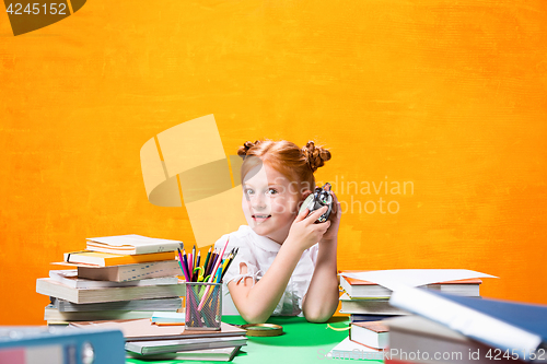 Image of Teen girl with lot of books