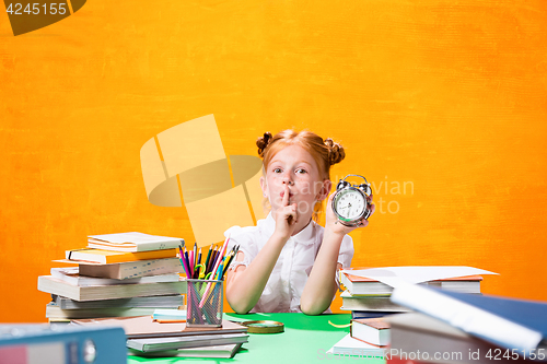 Image of Teen girl with lot of books