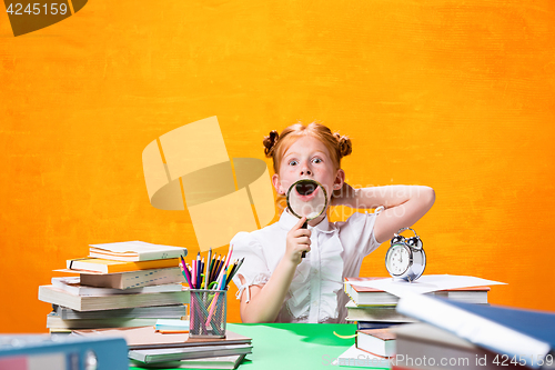 Image of Teen girl with lot of books