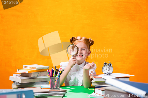 Image of Teen girl with lot of books