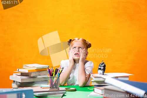 Image of Teen girl with lot of books