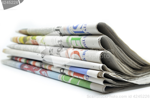 Image of Newspapers folded and stacked