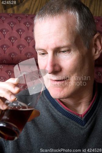 Image of Man Drinking Beer