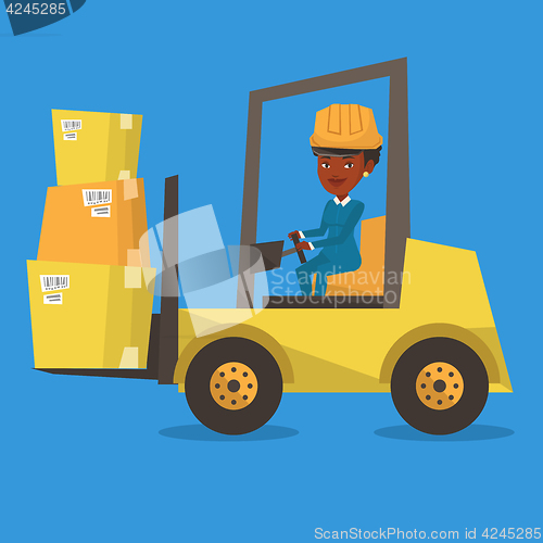 Image of Warehouse worker moving load by forklift truck.