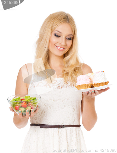 Image of Woman with cake and vegetables