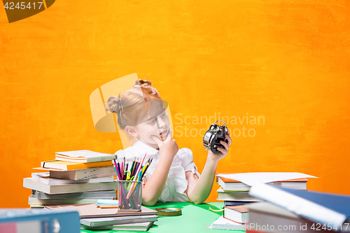 Image of Teen girl with lot of books