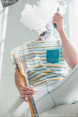 Image of The face of vaping young man