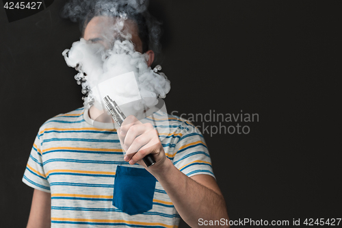 Image of The face of vaping young man