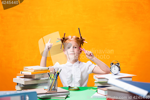 Image of Teen girl with lot of books