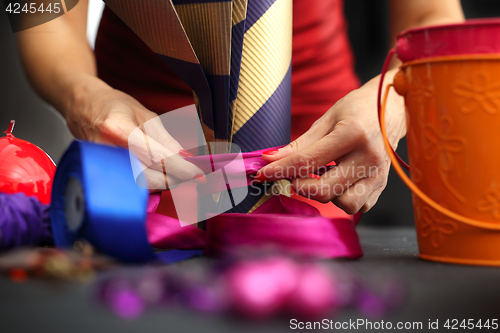 Image of Packaging holiday gifts.