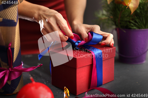 Image of Christmas gift idea how to decorate a gift Beautifully wrapped gift