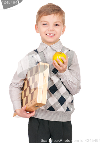 Image of Little boy with chessboard