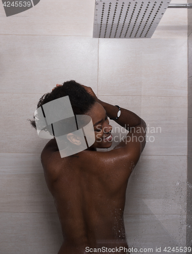 Image of African American woman in the shower