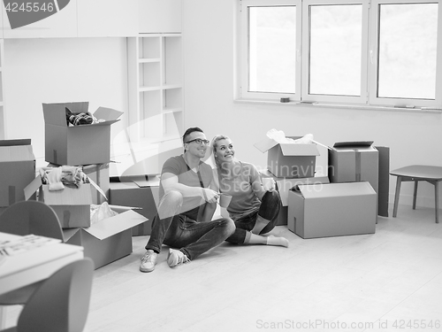 Image of young couple in new house