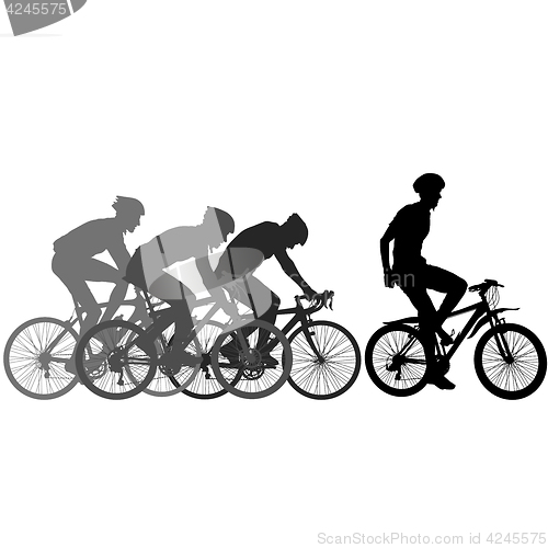 Image of Silhouettes of racers on a bicycle, fight at the finish line