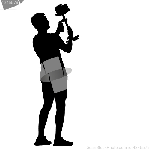 Image of Cameraman with video camera steadicam . Silhouettes on white background