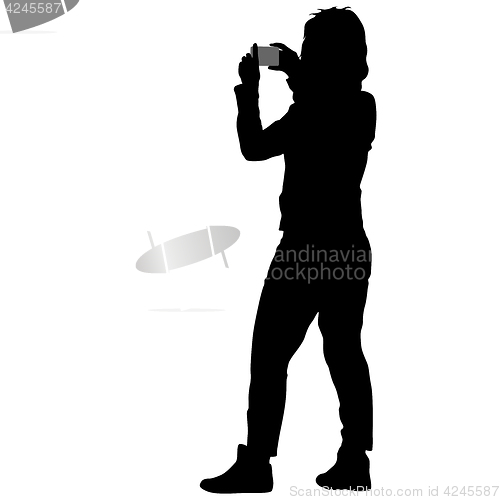 Image of Silhouettes woman taking selfie with smartphone on white background