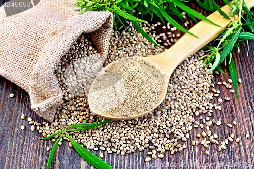 Image of Flour hemp in spoon with bag on board