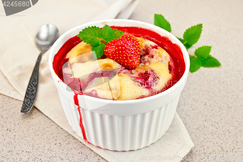 Image of Pudding strawberry in bowl on granite table